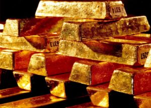 Read more about the article Ouro cai para 1.997 dólares, depois de semana acima dos 2.000 dólares